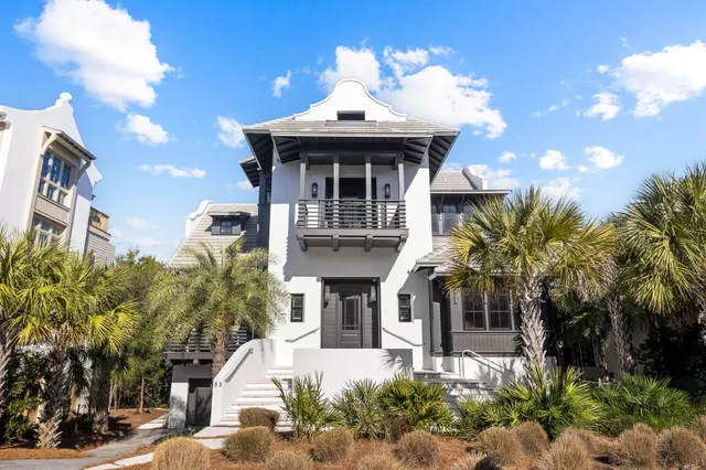 a view of a house with a sink and yard