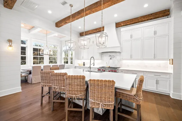 a kitchen that has a lot of cabinets in it