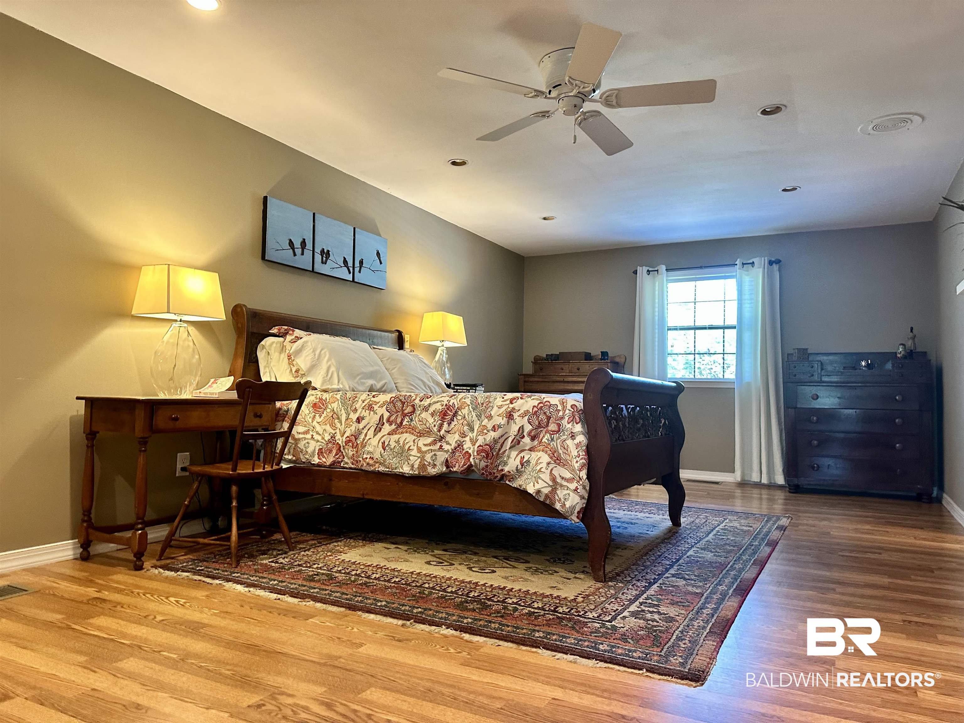117 Belle Meade Brewton, AL 36426 - Photo 19 of 62 Bedroom with ceiling fan and hardwood / wood-style flooring