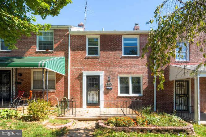 3821 Kimble Road Baltimore, MD 21218 - Photo 1 of 29 a front view of a house with a yard