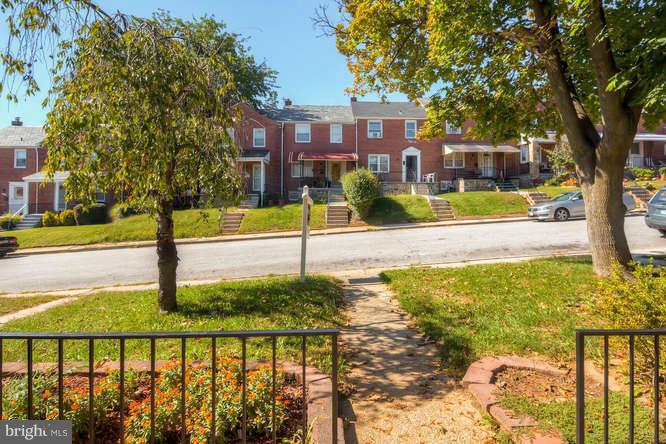 3821 Kimble Road Baltimore, MD 21218 - Photo 3 of 29 a view of a garden with a pathway