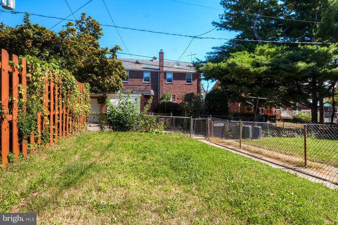 3821 Kimble Road Baltimore, MD 21218 - Photo 28 of 29 a view of a backyard with potted plants