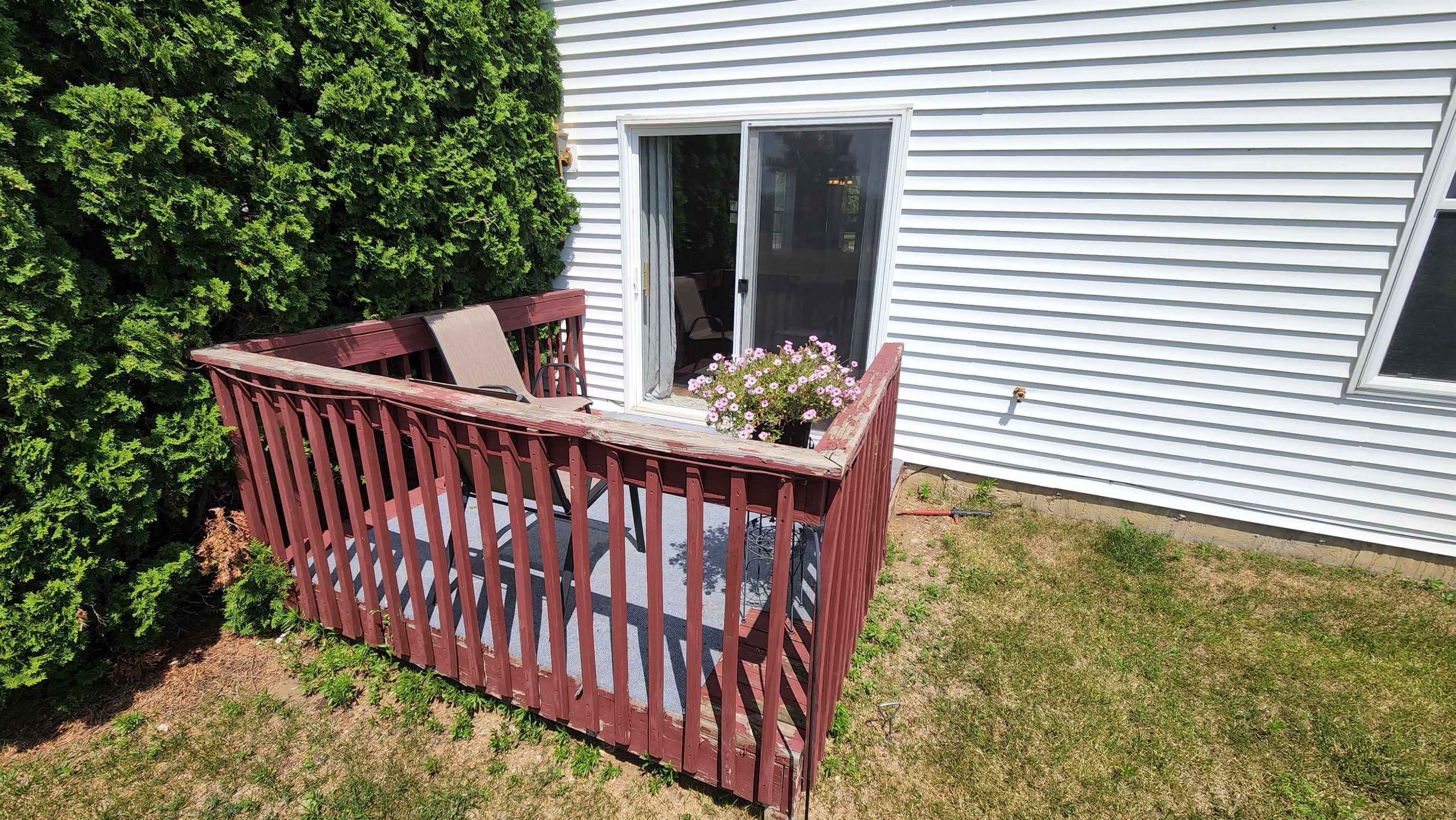 10326 Marblewing Road Roscoe, IL 61073 - Photo 12 of 12 a view of a chair and table in the balcony