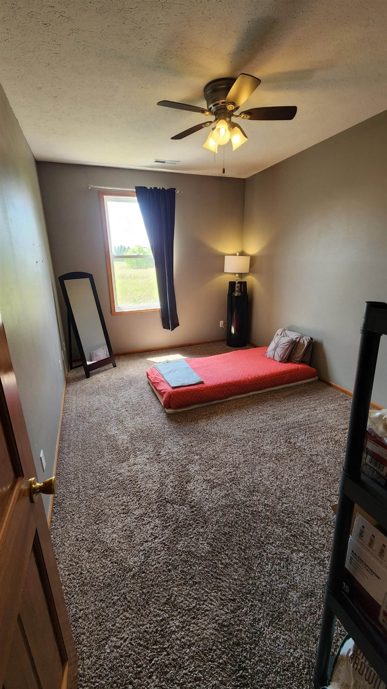 10326 Marblewing Road Roscoe, IL 61073 - Photo 9 of 12 a bedroom with a bed and a chandelier
