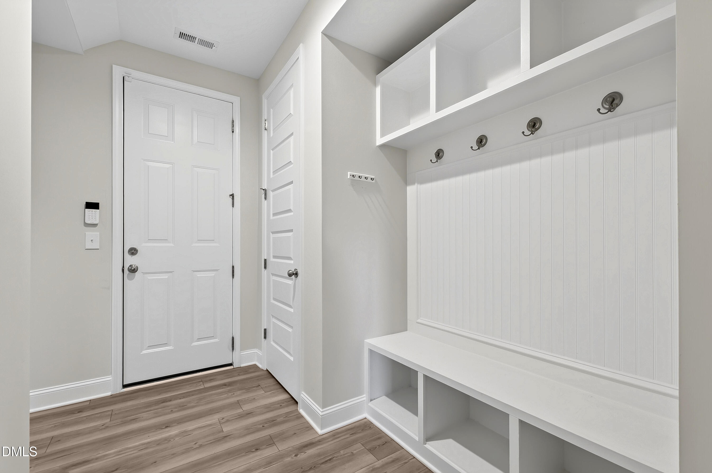 1300 Commons Ford Place Apex, NC 27539 - Photo 37 of 70 a view of an entryway with wooden floor