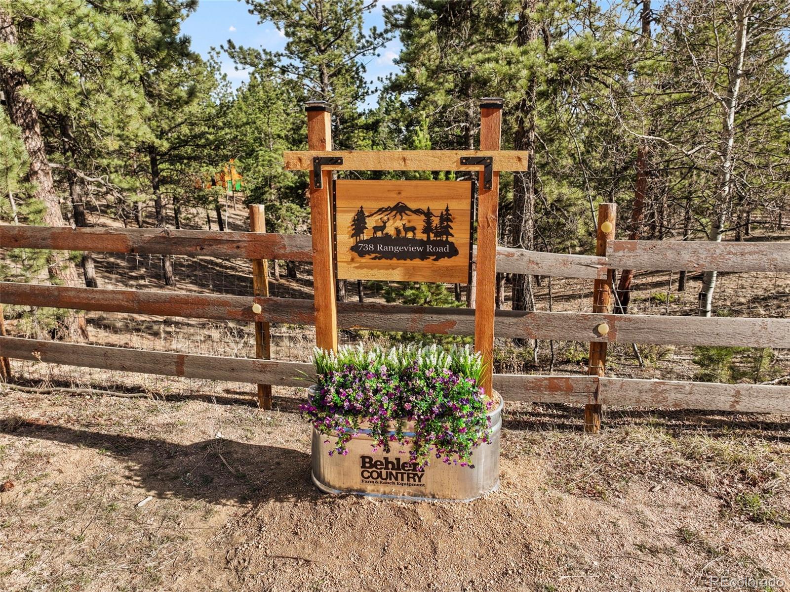 738 Rangeview Road Divide, CO 80814 - Photo 45 of 47 a sign on the side of a road