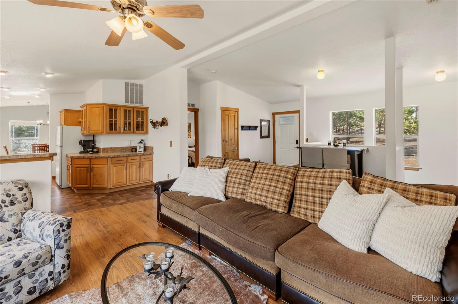 738 Rangeview Road Divide, CO 80814 - Photo 5 of 47 a living room with furniture and a large window