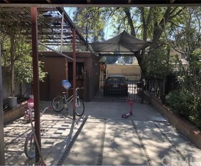 461 West Jackson Street Rialto, CA 92376 - Photo 1 of 1 a view of a chairs and table in the patio