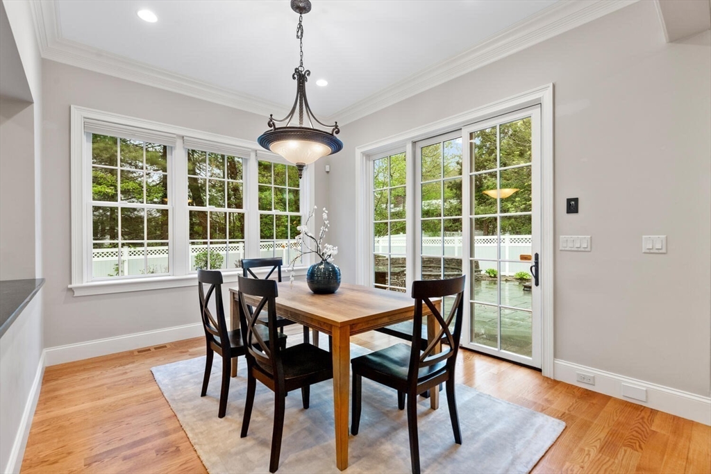 107 Kendall Road Lexington, MA 02421 - Photo 14 of 40 a view of a dining room with furniture window and outside view
