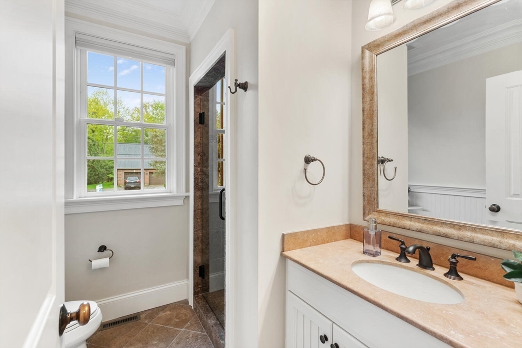 107 Kendall Road Lexington, MA 02421 - Photo 17 of 40 a en suite bathroom with a granite countertop sink and a mirror