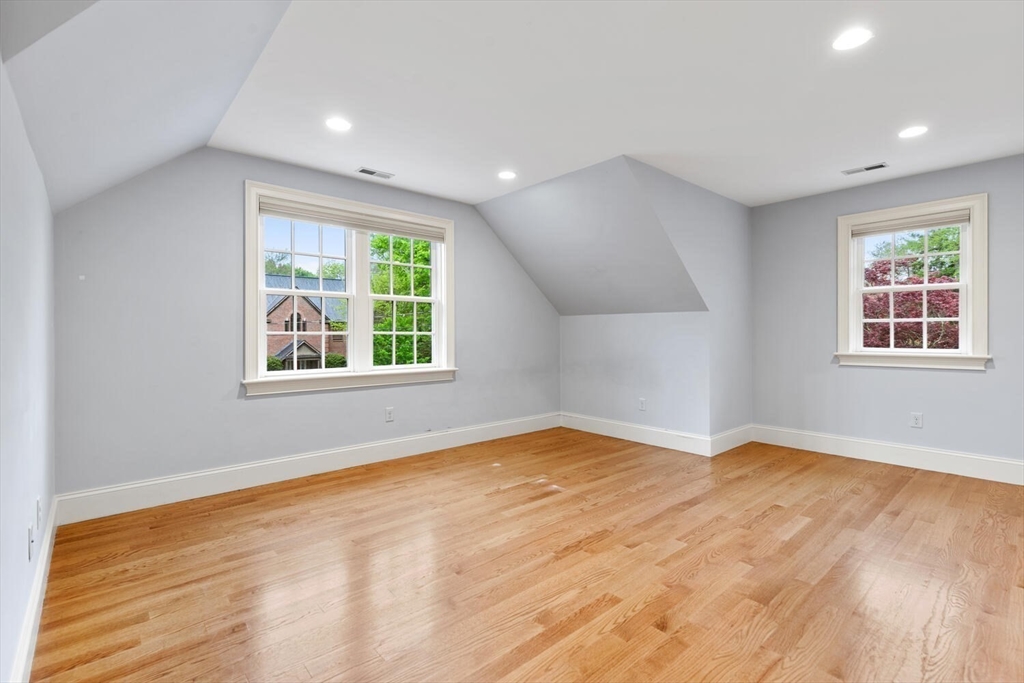 107 Kendall Road Lexington, MA 02421 - Photo 27 of 40 wooden floor in an empty room with a window