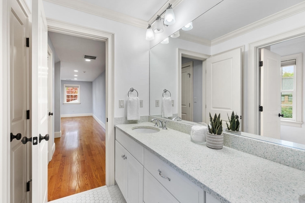 107 Kendall Road Lexington, MA 02421 - Photo 28 of 40 a bathroom with a sink double vanity granite tub and shower
