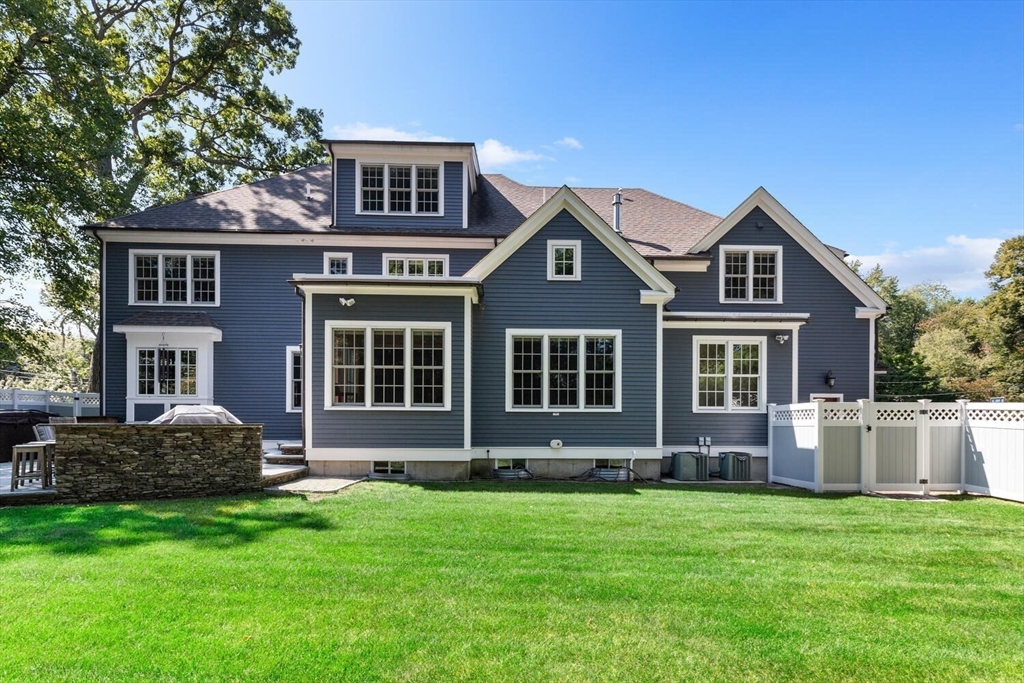 107 Kendall Road Lexington, MA 02421 - Photo 33 of 40 a front view of a house with a garden