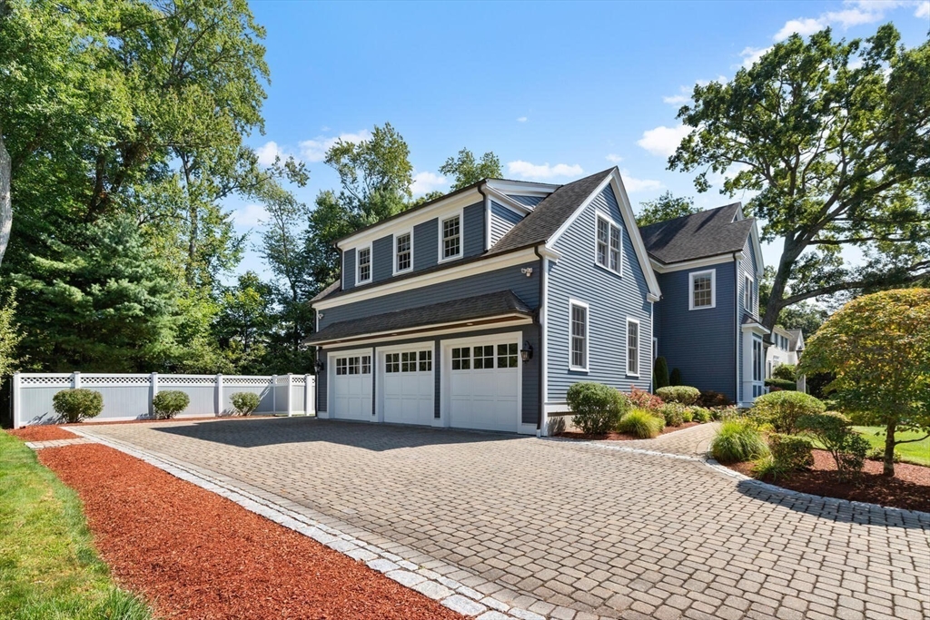 107 Kendall Road Lexington, MA 02421 - Photo 34 of 40 a front view of a house with a yard