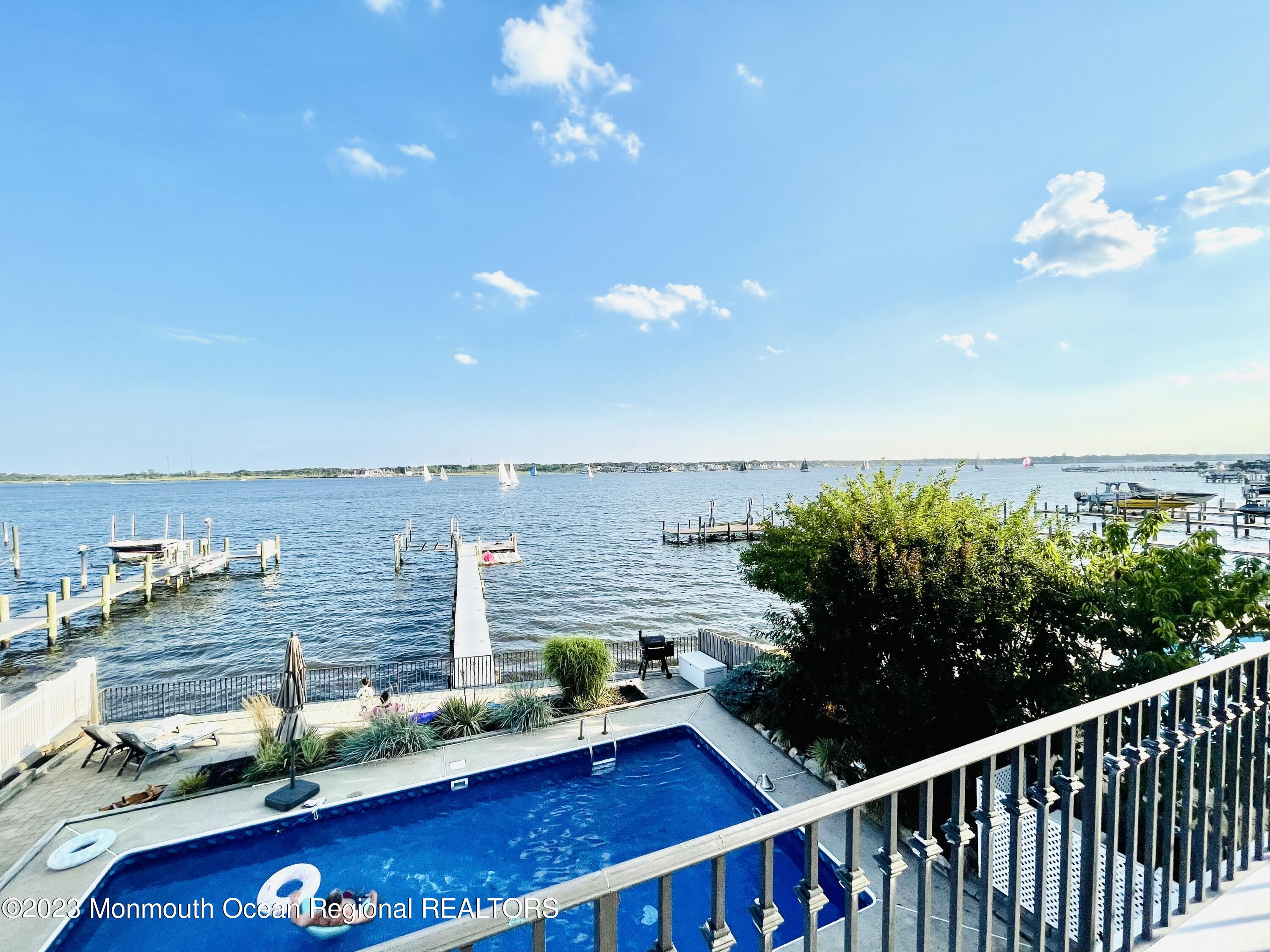 709 Princeton Avenue Brick, NJ 08724 - Photo 1 of 52 a view of a balcony with chairs