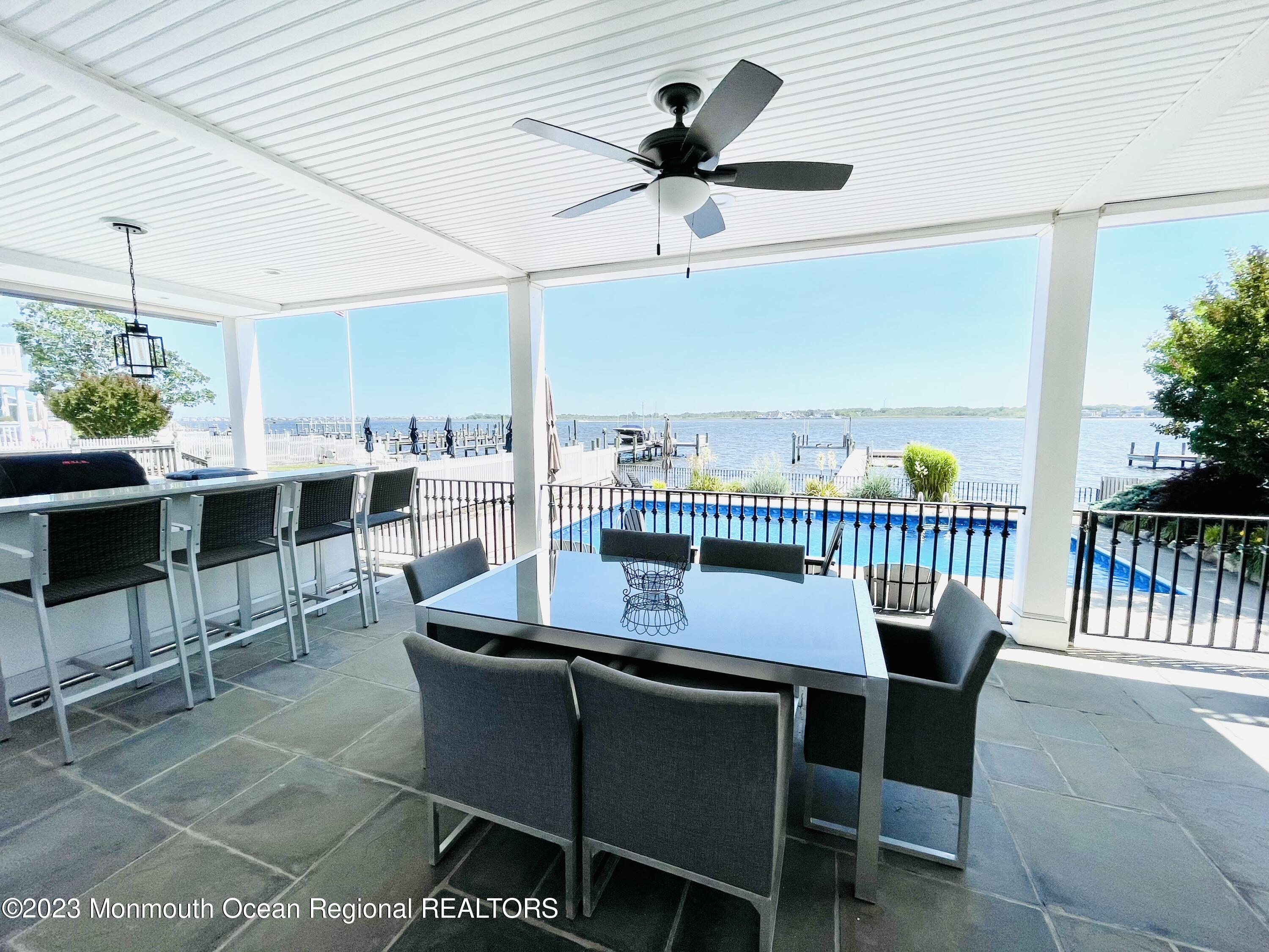 709 Princeton Avenue Brick, NJ 08724 - Photo 14 of 52 a view of a dining room with furniture window and wooden floor