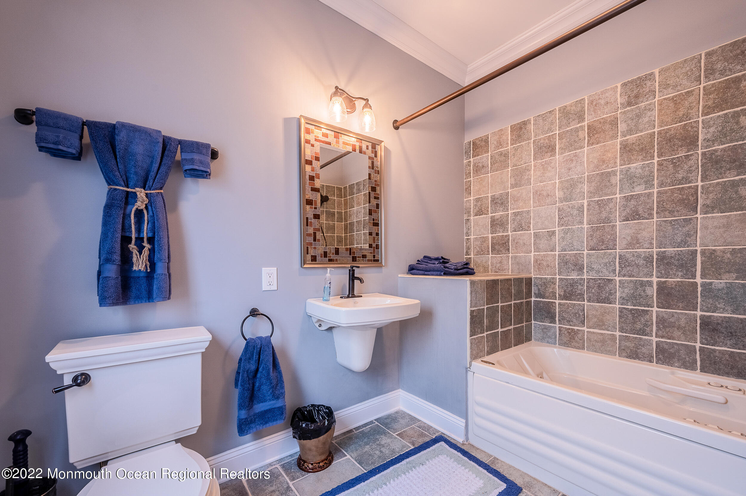 709 Princeton Avenue Brick, NJ 08724 - Photo 20 of 52 a bathroom with a toilet a sink and bathtub