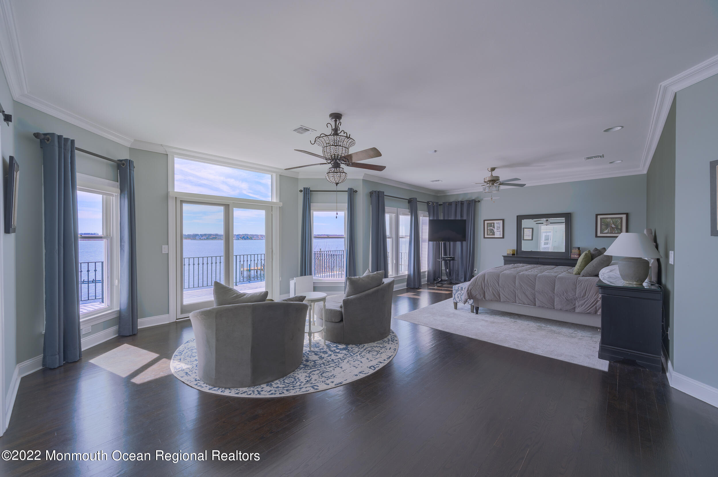 709 Princeton Avenue Brick, NJ 08724 - Photo 23 of 52 a living room with furniture and a chandelier