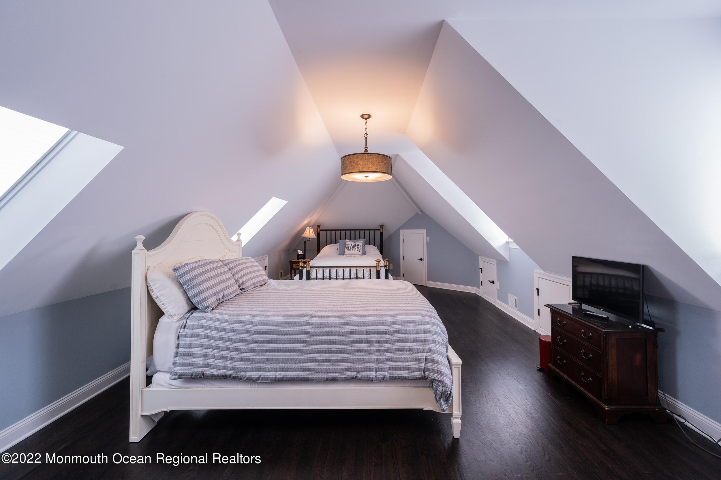 709 Princeton Avenue Brick, NJ 08724 - Photo 35 of 52 a bedroom with a bed and wooden floor