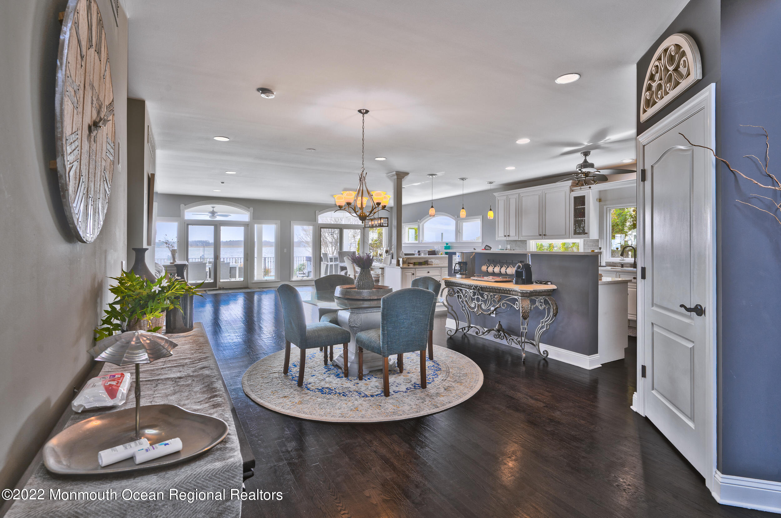 709 Princeton Avenue Brick, NJ 08724 - Photo 5 of 52 a dining room with furniture a kitchen view and wooden floor