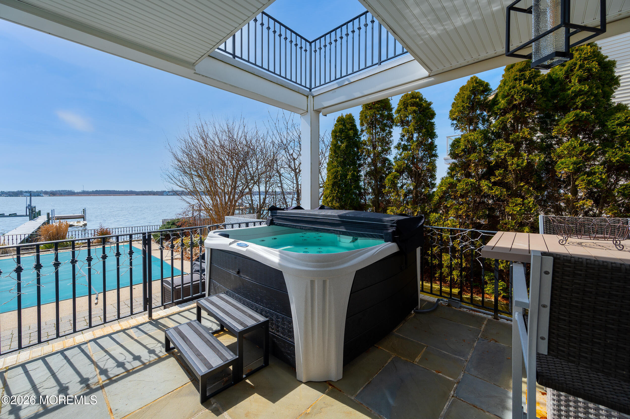 709 Princeton Avenue Brick, NJ 08724 - Photo 51 of 52 a view of a porch with furniture and a yard