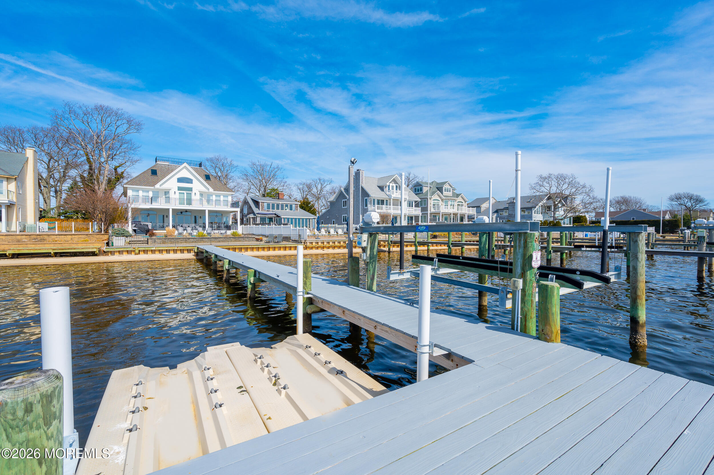 709 Princeton Avenue Brick, NJ 08724 - Photo 52 of 52 a view of a terrace with wooden floor and outdoor seating