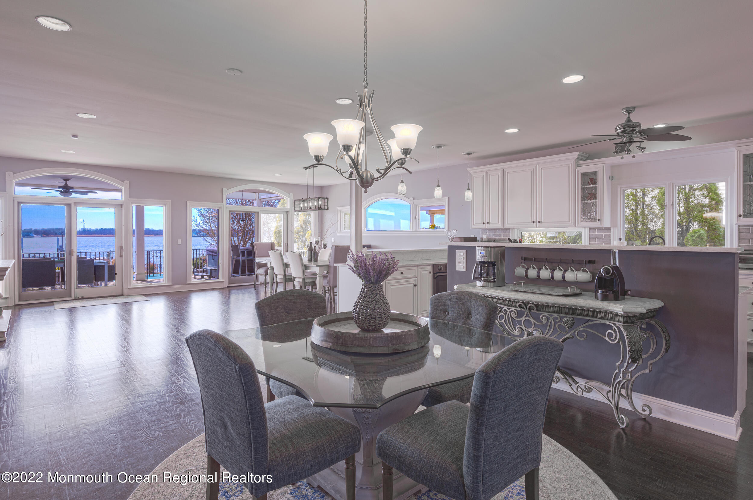 709 Princeton Avenue Brick, NJ 08724 - Photo 8 of 52 a view of a dining room with furniture a chandelier and wooden floor