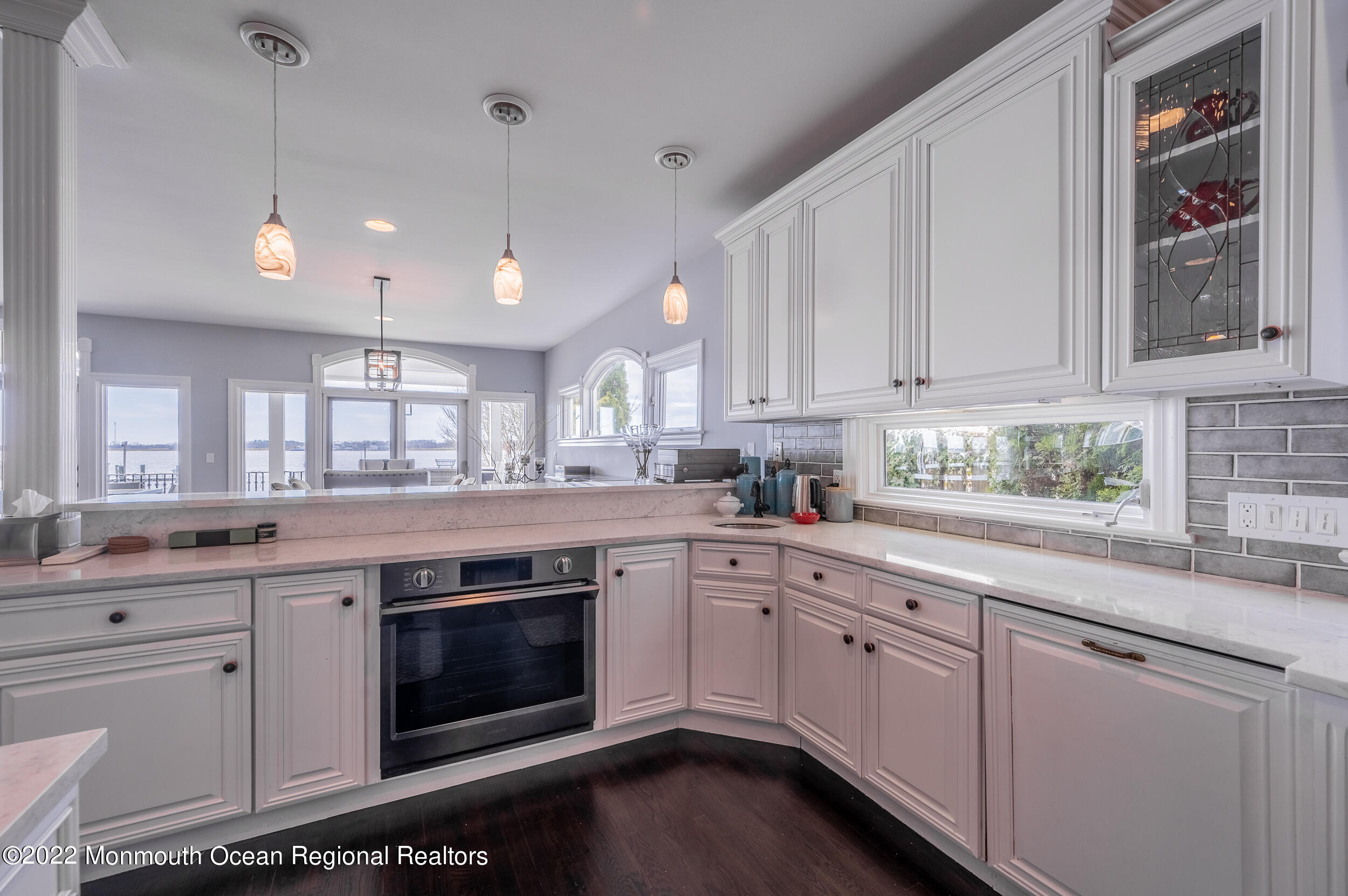 709 Princeton Avenue Brick, NJ 08724 - Photo 10 of 52 a kitchen with a sink stove and cabinets