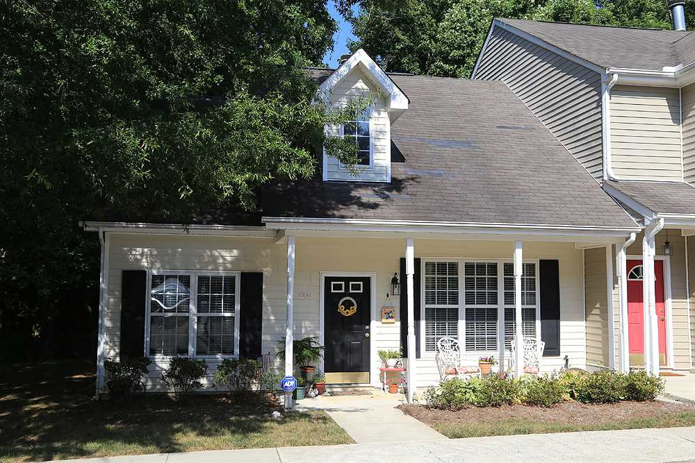 7321 Bonnie Ridge Court Raleigh, NC 27615 - Photo 1 of 14 Welcome home! END unit TH with Master DOWN on Cul-de-sac! Exterior Front