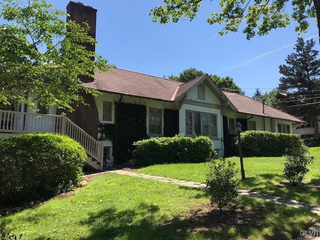 2122 Walnut Street Allentown, PA 18104 - Photo 1 of 31 a front view of a house with a yard