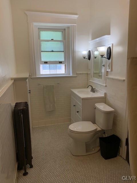 2122 Walnut Street Allentown, PA 18104 - Photo 18 of 31 a bathroom with a toilet sink and mirror