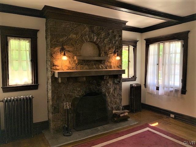 2122 Walnut Street Allentown, PA 18104 - Photo 8 of 31 a living room with furniture and a fireplace