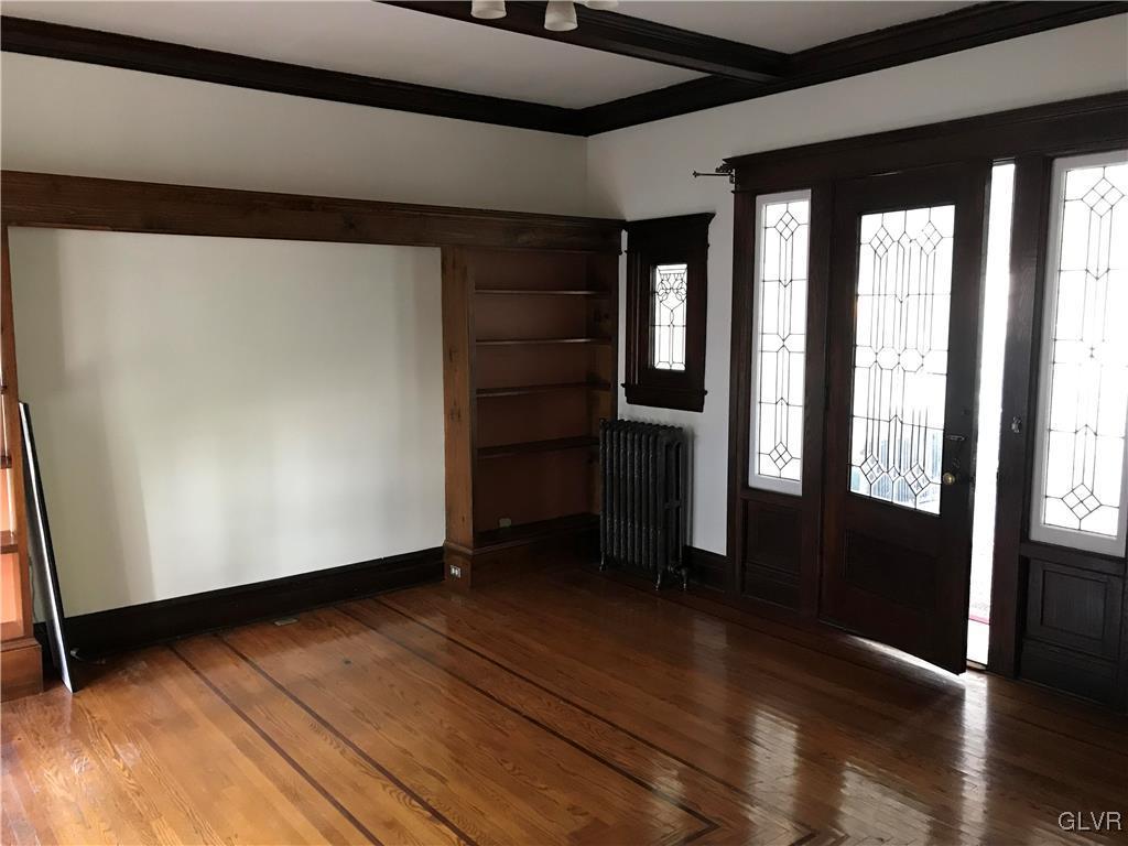 2122 Walnut Street Allentown, PA 18104 - Photo 9 of 31 wooden floor in an empty room with a window