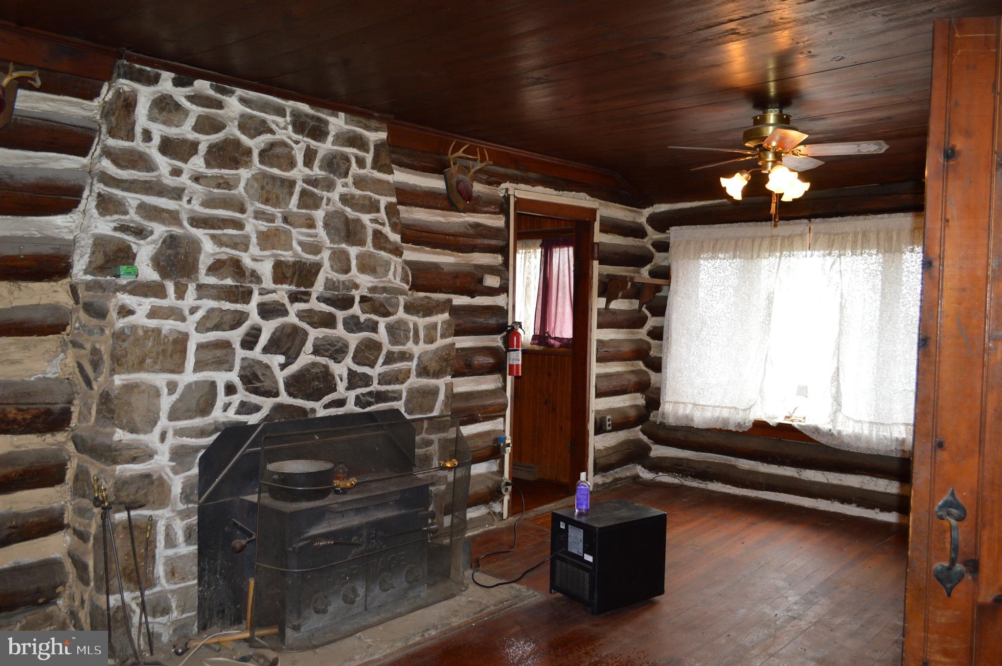 16 Mountain Side Road Dillsburg, PA 17019 - Photo 13 of 41 Living Room with wood stove