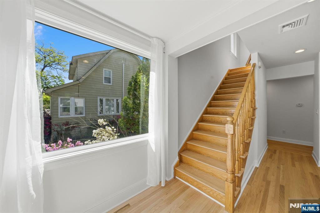 232 Riveredge Road Tenafly, NJ 07670 - Photo 6 of 50 a view of a front door and wooden floor