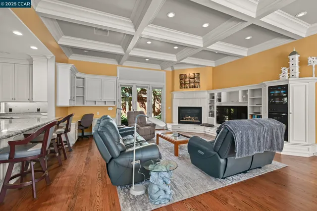 a view of a house with a yard patio and sitting area