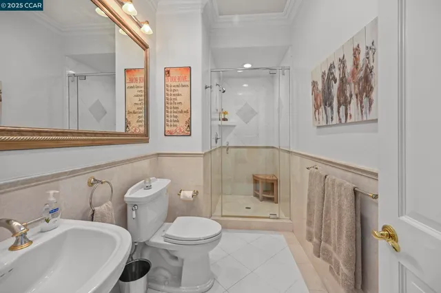 a view of a chair and tables in the patio