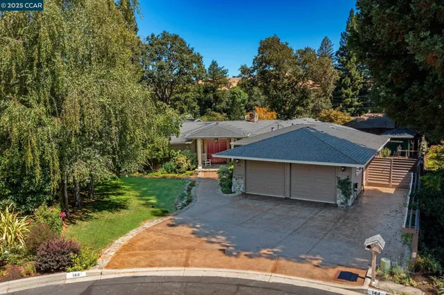 a bathroom with a toilet sink a mirror a shower and bathtub