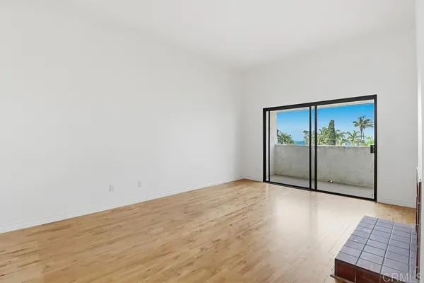 an empty room with sliding door