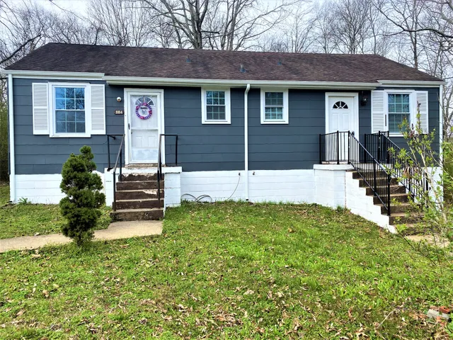 a house view with a garden space