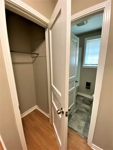 a bathroom with a toilet a sink and bathtub