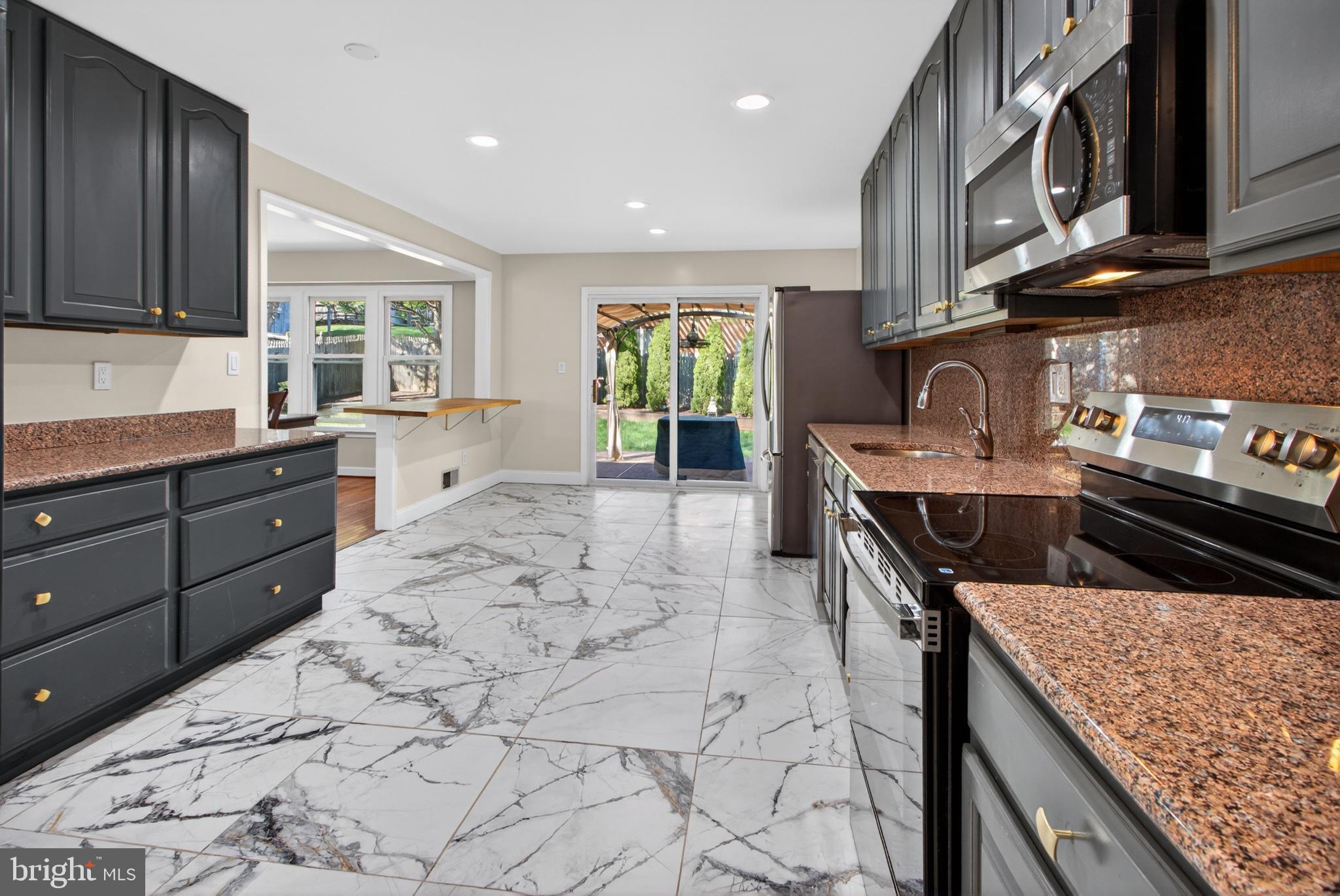 16 Redding Ridge Drive Gaithersburg, MD 20878 - Photo 14 of 53 Modern kitchen with elegant finishes.