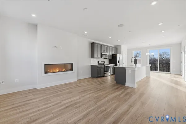 a view of kitchen with wooden floor