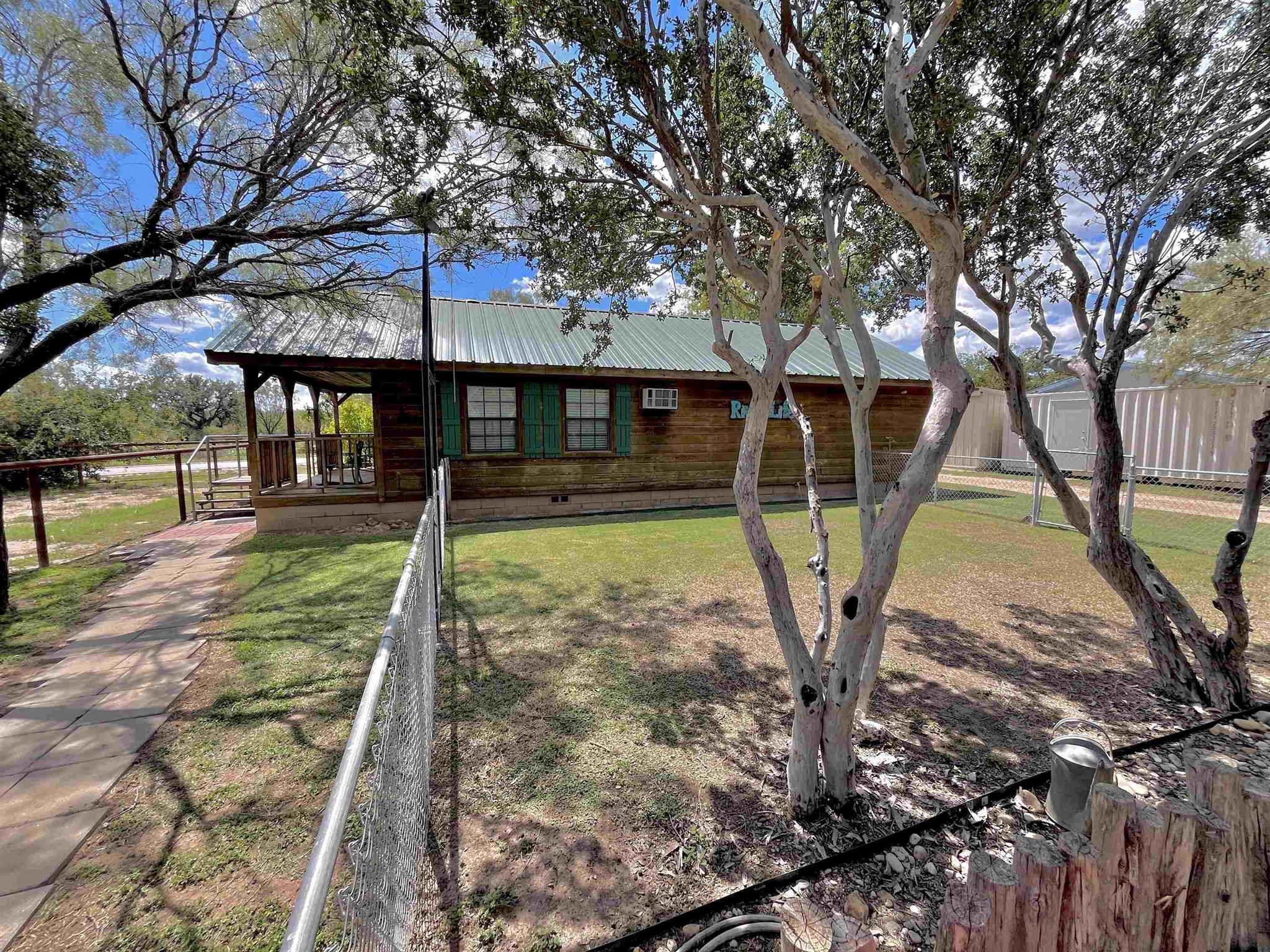 175 Elmer Road Llano, TX 78643 - Photo 1 of 25 a view of a park with iron fence