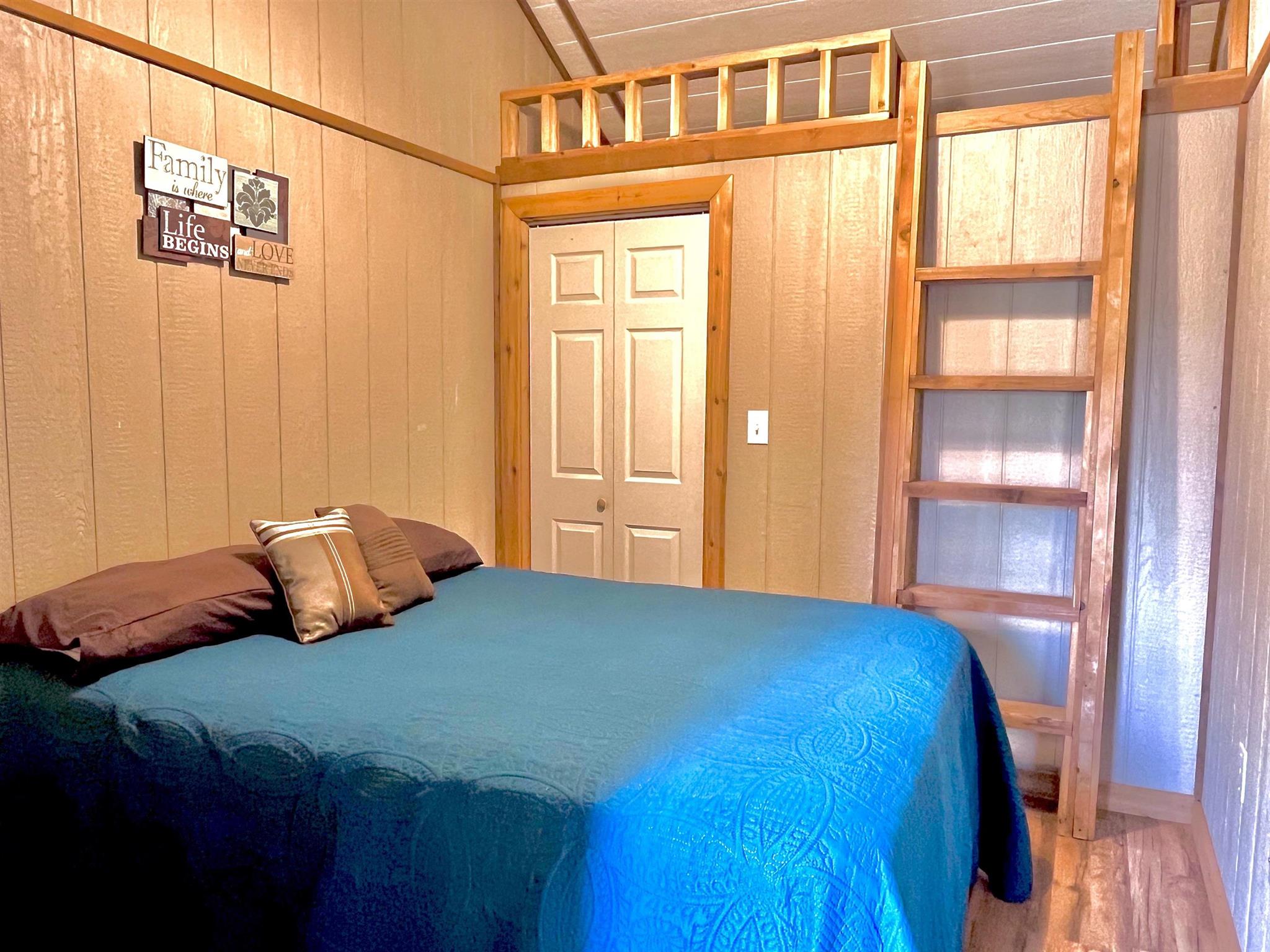 175 Elmer Road Llano, TX 78643 - Photo 15 of 25 a bedroom with a bed and a window