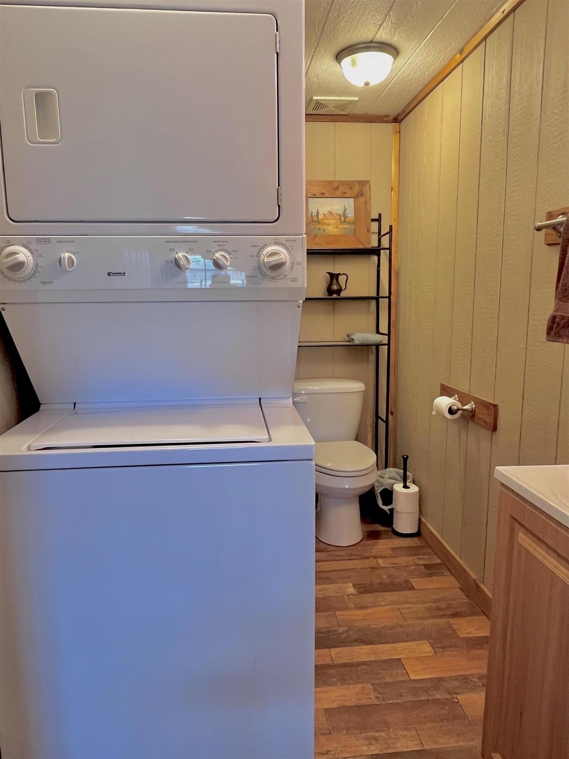 175 Elmer Road Llano, TX 78643 - Photo 17 of 25 a bathroom with a sink a toilet and shower
