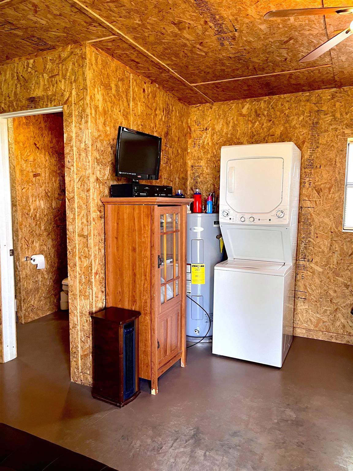 175 Elmer Road Llano, TX 78643 - Photo 21 of 25 a room with storage and utility