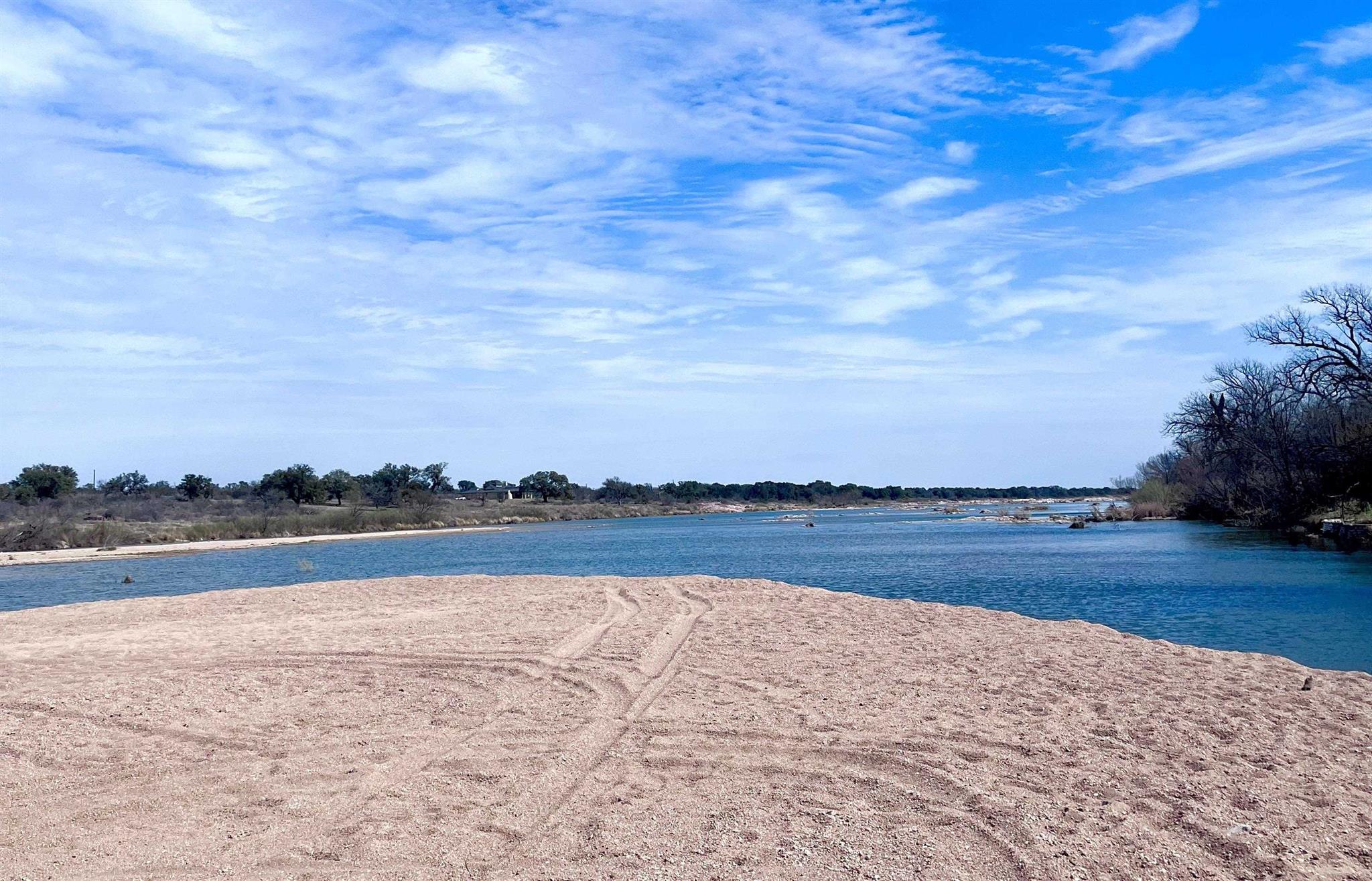 175 Elmer Road Llano, TX 78643 - Photo 23 of 25 a view of an ocean and beach