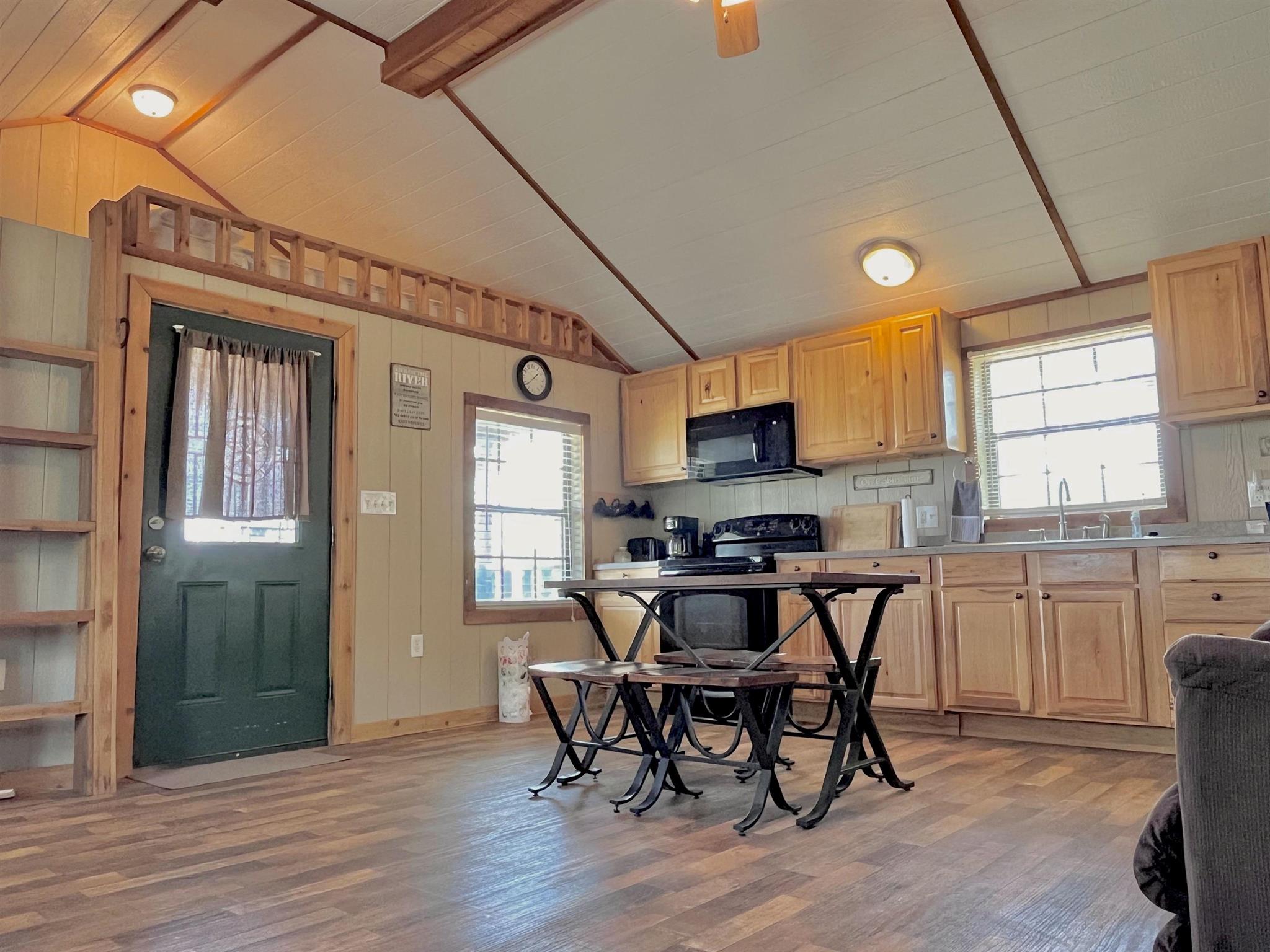 175 Elmer Road Llano, TX 78643 - Photo 9 of 25 a view of a dining room with furniture and a window