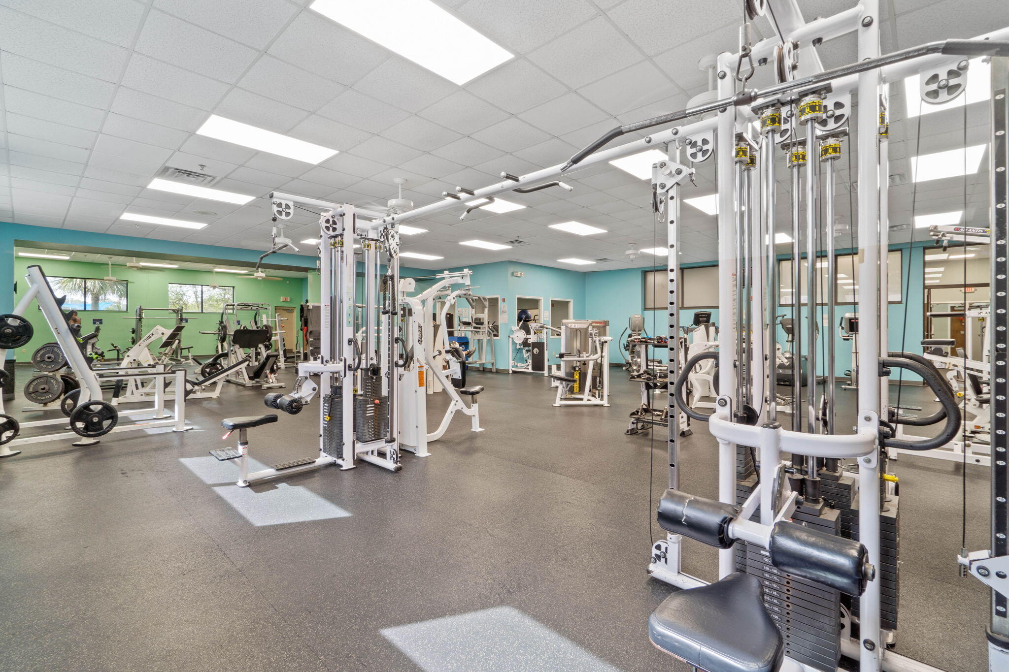 6983 Snug Waters Road Navarre, FL 32566 - Photo 46 of 48 a view of a room with gym equipment